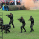 Soldiers practice an anti-terrorism drill using real weapons.